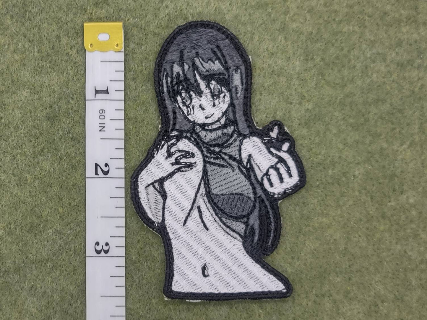 Lewd anime waifu embroidered patch.