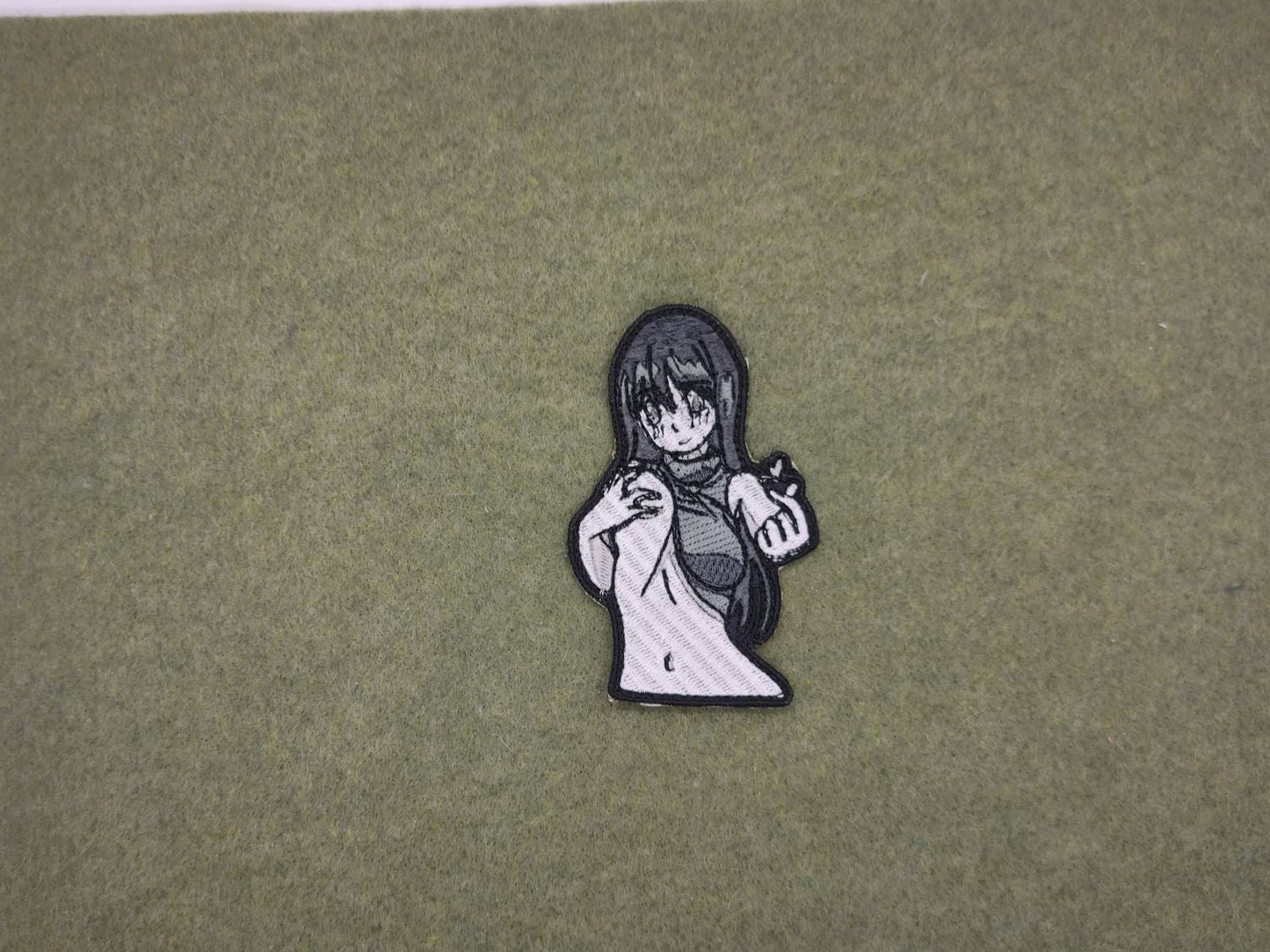 Lewd anime waifu embroidered patch.